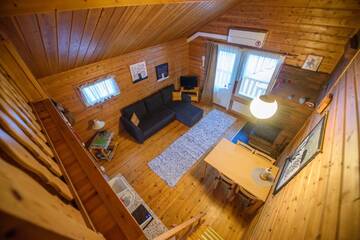 Фото номера Апартаменты с сауной Дома для отпуска Holiday Village Kuukiuru г. Вуостимо 2