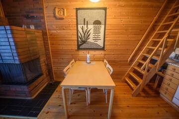 Фото номера Апартаменты с сауной Дома для отпуска Holiday Village Kuukiuru г. Вуостимо 3