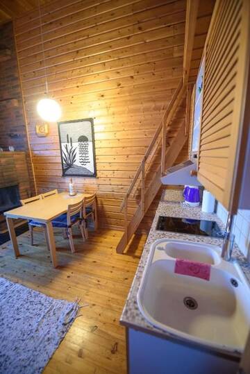Фото номера Апартаменты с сауной Дома для отпуска Holiday Village Kuukiuru г. Вуостимо 11