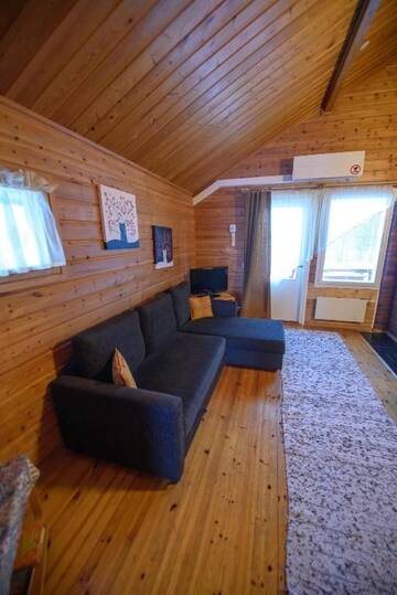 Фото номера Апартаменты с сауной Дома для отпуска Holiday Village Kuukiuru г. Вуостимо 12