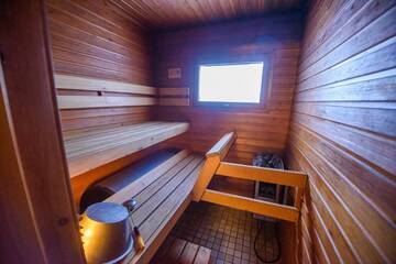 Фото номера Апартаменты с сауной Дома для отпуска Holiday Village Kuukiuru г. Вуостимо 13