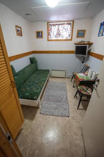 Фото номера Одноместный номер с общим душем и туалетом Дома для отпуска Holiday Village Kuukiuru г. Вуостимо 8