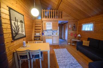 Фото номера Апартаменты с сауной Дома для отпуска Holiday Village Kuukiuru г. Вуостимо 17